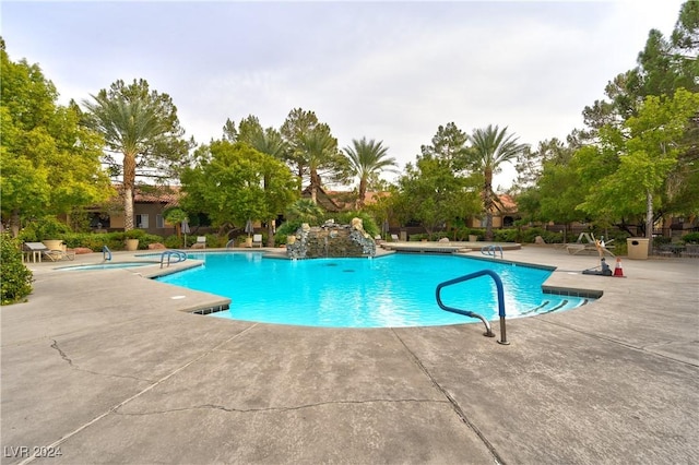 view of swimming pool featuring a patio