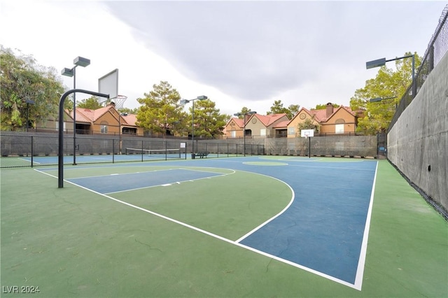 view of sport court with tennis court