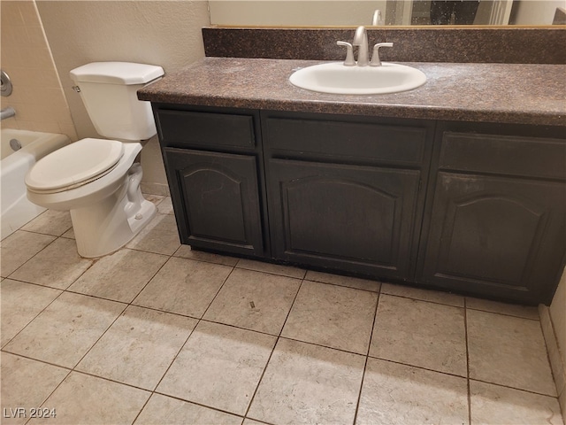 full bathroom featuring tile patterned floors, vanity,  shower combination, and toilet