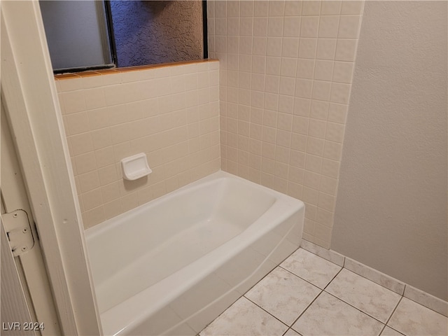 bathroom with tile patterned floors