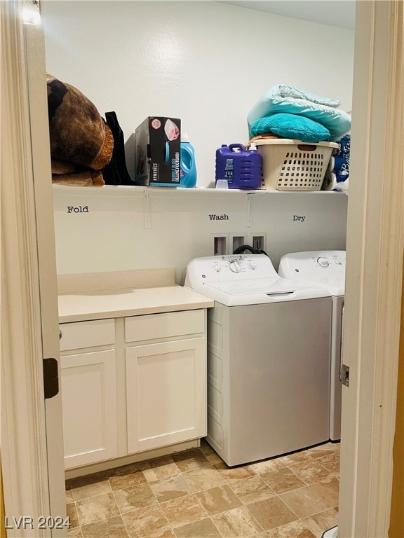 laundry room featuring washing machine and clothes dryer