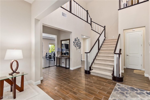 entrance foyer with a towering ceiling