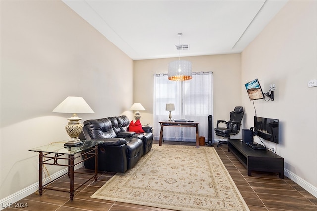 living room with a chandelier