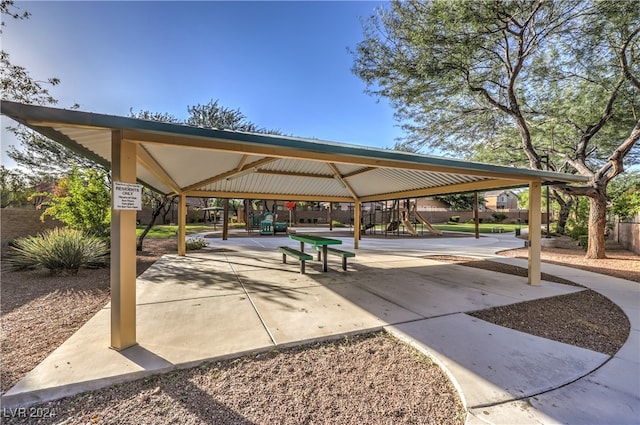 view of property's community featuring a playground