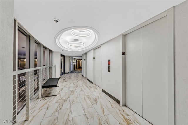 3111 Bel Air Dr Unit 25A, Las Vegas, NV 89109 - hall with light marble finish flooring and elevator