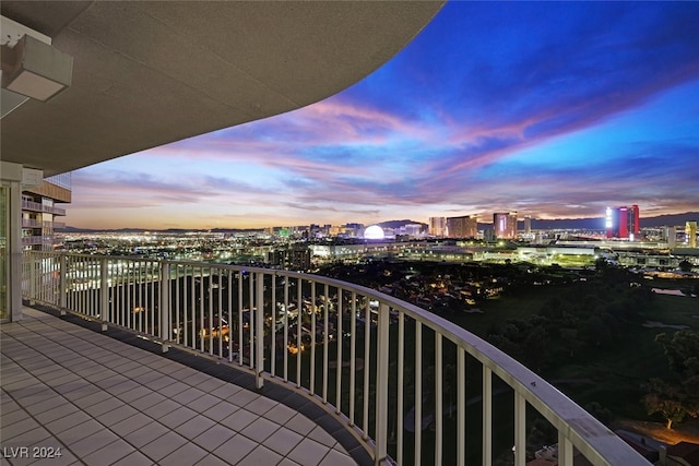 view of balcony at dusk