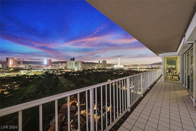 view of balcony at dusk