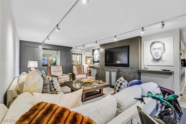 3111 Bel Air Dr Unit 25A, Las Vegas, NV 89109 - living room featuring rail lighting
