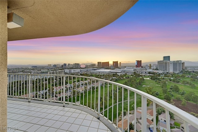 view of balcony at dusk