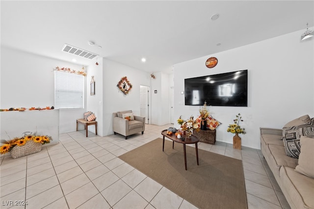 living room featuring light tile patterned flooring