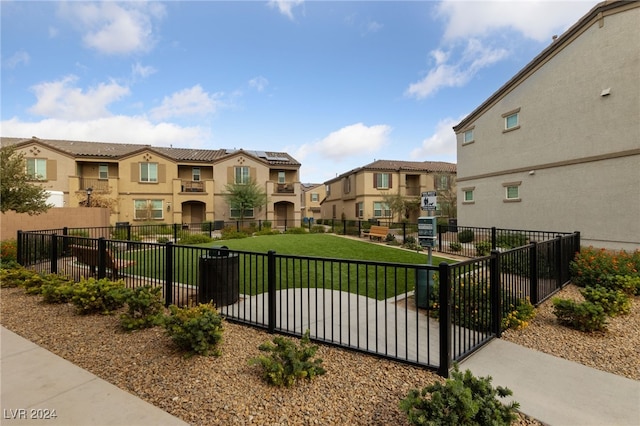 view of community featuring a yard