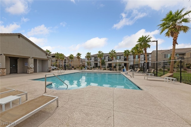 view of pool featuring a patio