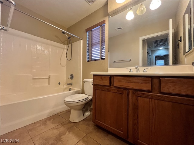 full bathroom featuring vanity, shower / tub combination, toilet, and tile patterned flooring