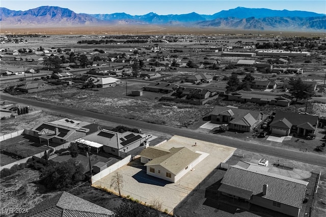 drone / aerial view featuring a mountain view