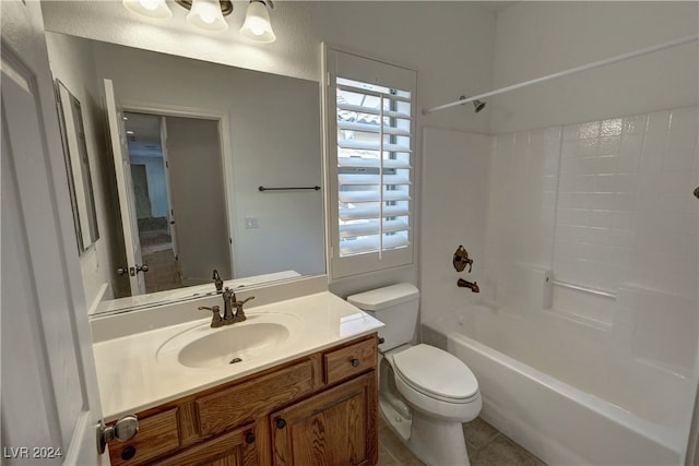 full bathroom with toilet, tile patterned flooring, vanity, and shower / bathtub combination