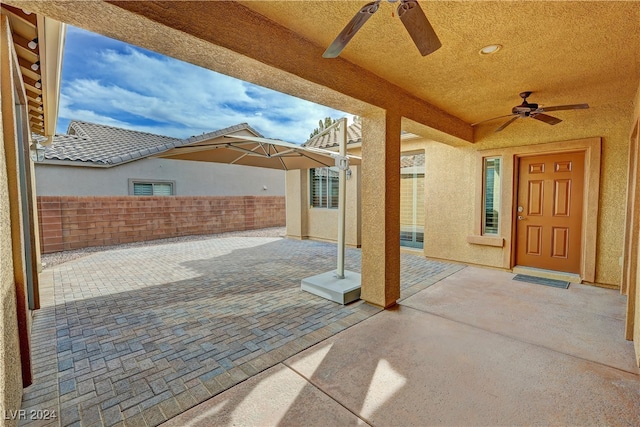 view of patio / terrace featuring ceiling fan