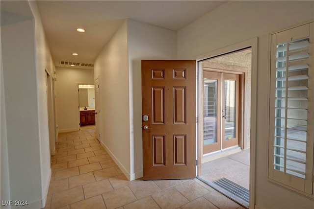 view of tiled foyer entrance