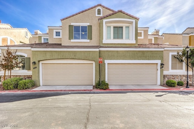 view of front of home featuring a garage