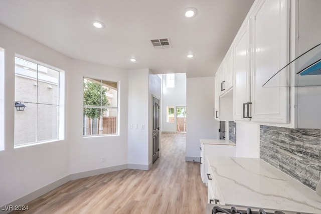 interior space with light hardwood / wood-style flooring