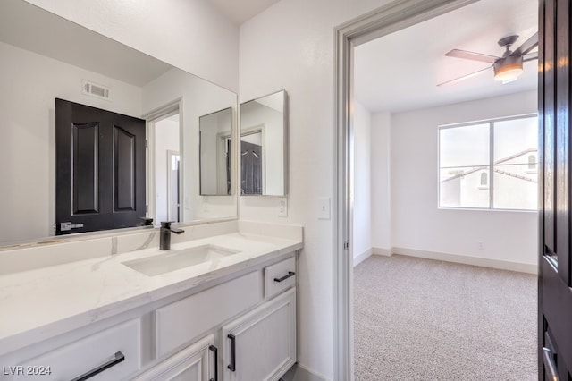 bathroom with vanity and ceiling fan