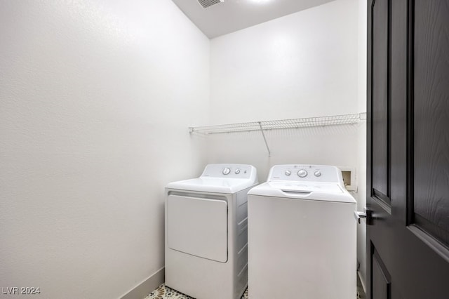 laundry room featuring independent washer and dryer