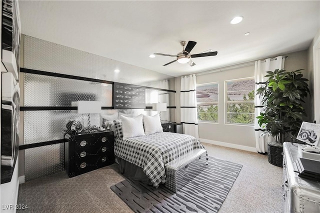 carpeted bedroom featuring ceiling fan