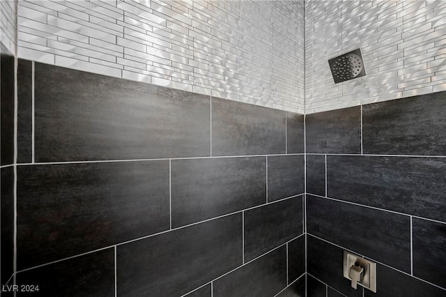 room details with a tile shower