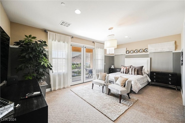 bedroom with carpet, french doors, and access to outside