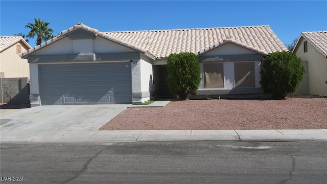 ranch-style home with a garage