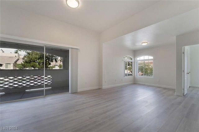 spare room with light hardwood / wood-style floors