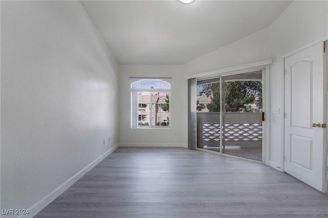 spare room featuring hardwood / wood-style floors