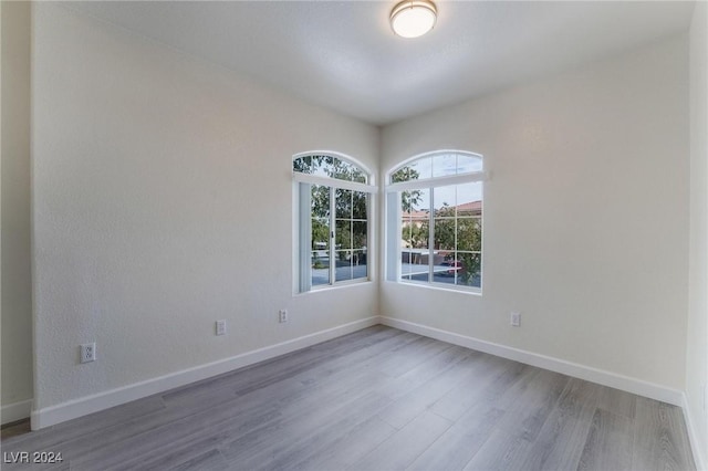 7400 W Flamingo Rd Unit 2013, Las Vegas, NV 89147 - spare room featuring wood finished floors and baseboards