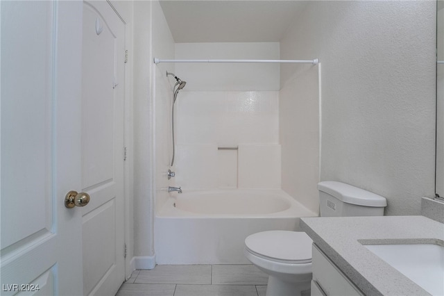 full bathroom with tile patterned floors, vanity, bathing tub / shower combination, and toilet