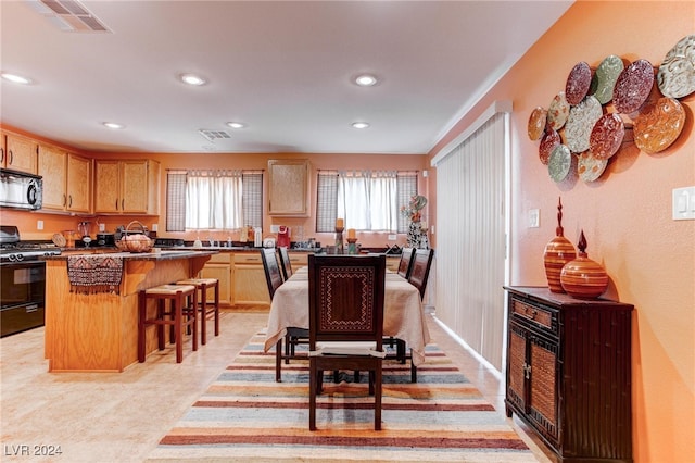 dining area with a wealth of natural light