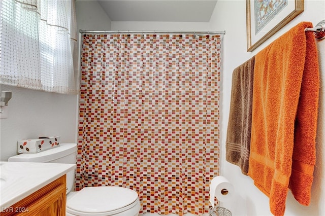 bathroom featuring toilet, a shower with curtain, vanity, and tile walls