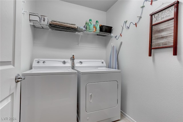 washroom featuring independent washer and dryer