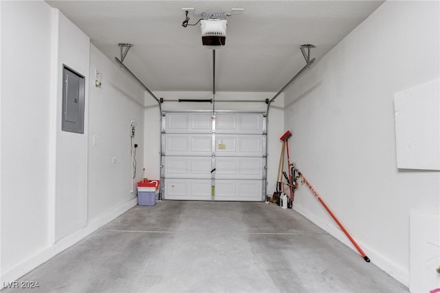 garage featuring electric panel and a garage door opener