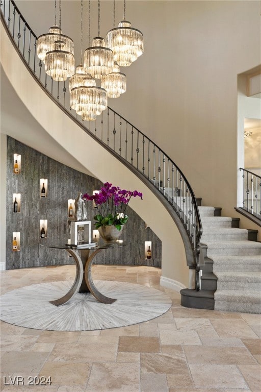 foyer featuring a high ceiling