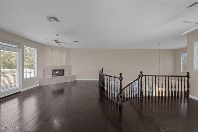 1931 Fox Canyon Cir, Las Vegas, NV 89117 - living area with ceiling fan, baseboards, plenty of natural light, and hardwood / wood-style floors