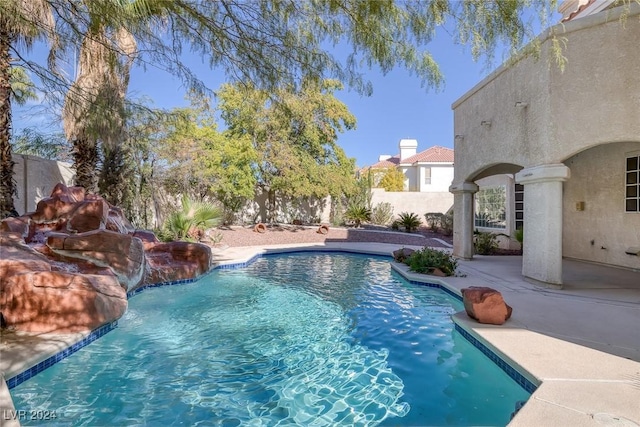 1931 Fox Canyon Cir, Las Vegas, NV 89117 - view of swimming pool featuring a patio area and a fenced backyard