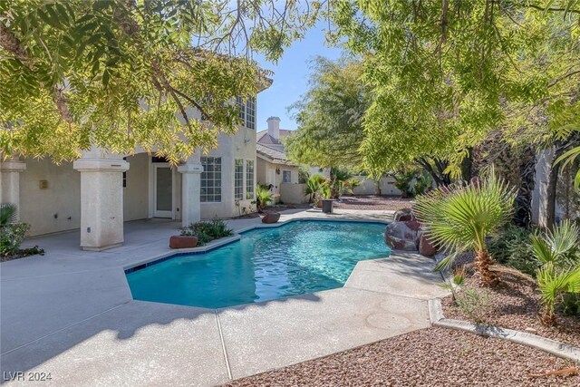 1931 Fox Canyon Cir, Las Vegas, NV 89117 - view of swimming pool featuring a patio