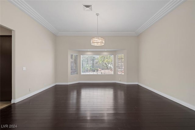 1931 Fox Canyon Cir, Las Vegas, NV 89117 - empty room with a chandelier, dark wood-style flooring, crown molding, and baseboards