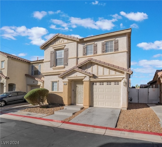 view of front of home with a garage