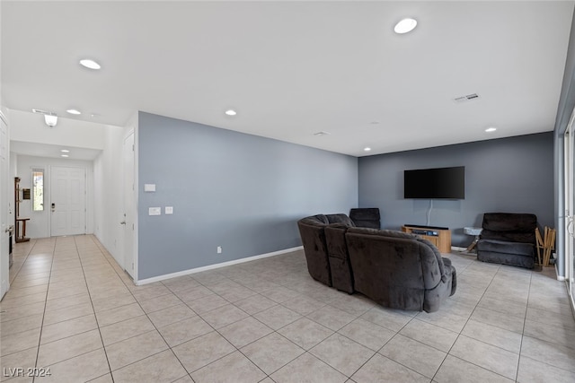 living room with light tile patterned flooring