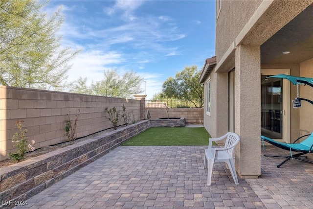 6370 Ava Ridge Ave, Las Vegas, NV 89141 - fenced backyard with a patio area