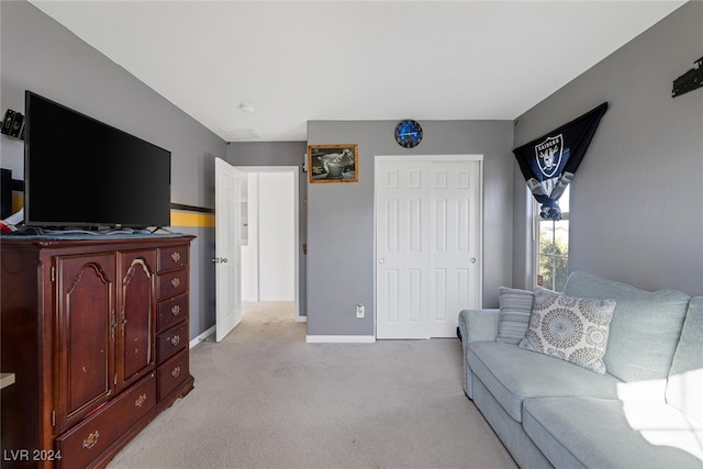 living room featuring light carpet