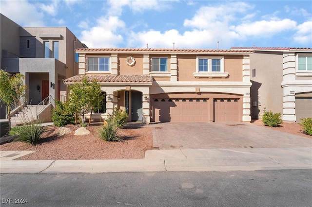 view of front of home with a garage