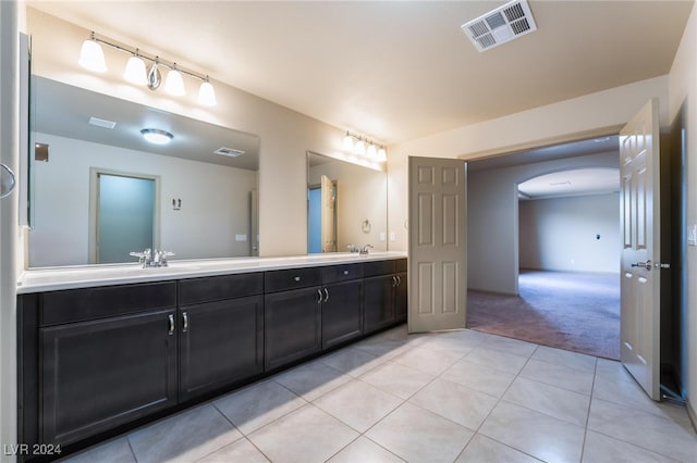 bathroom with vanity and tile patterned floors