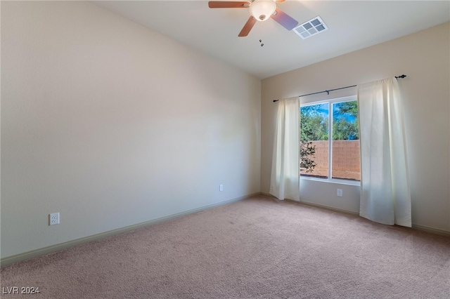 carpeted empty room with ceiling fan