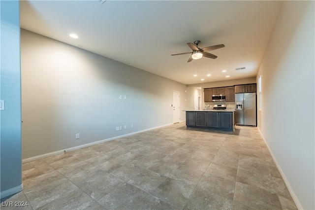 2664 Chinaberry Hill St, Laughlin, NV 89029 - unfurnished living room featuring a ceiling fan, baseboards, and recessed lighting